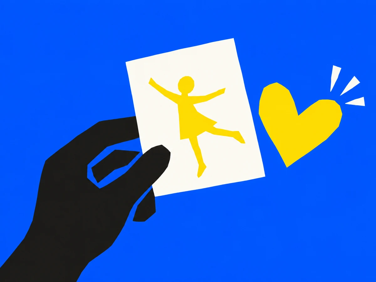 A black hand holds a yellow photo with a small person silhouette close to a simple yellow heart.